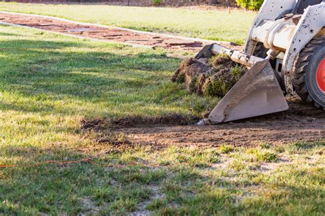 how to grade a road with a skid steer|best skid steer for grading.